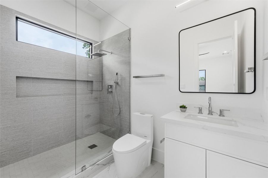 and beautifully appointed ensuite bath