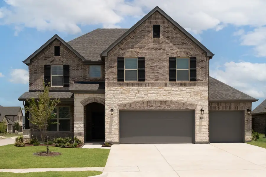 Front exterior of a new home in Brookville Estates, Forney, TX, highlighting curb appeal (Image 1). Front exterior of a new home in Brookville Estates, Forney, TX, highlighting curb appeal (Image 1).