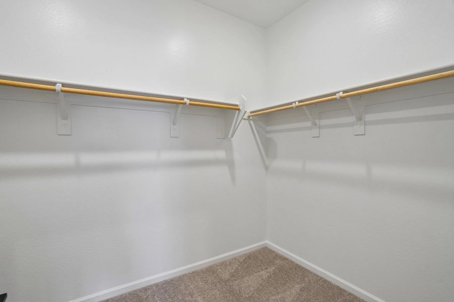 Primary walk in closet Primary walk in closet