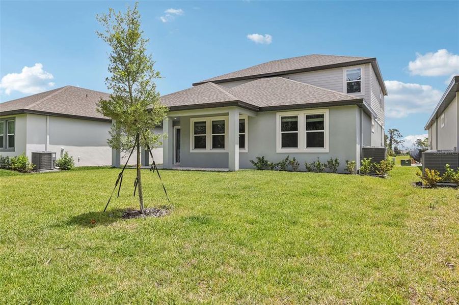 Exterior details and patio area of a home in Legends Preserve - Signature Series, Daytona Beach (Image 28).
