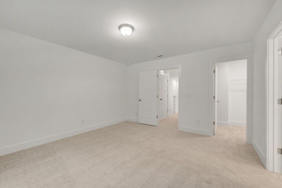 Spacious, unfurnished interior of a new home in Ashmore Townes, Garner (Image 12). Spacious, unfurnished interior of a new home in Ashmore Townes, Garner (Image 12).