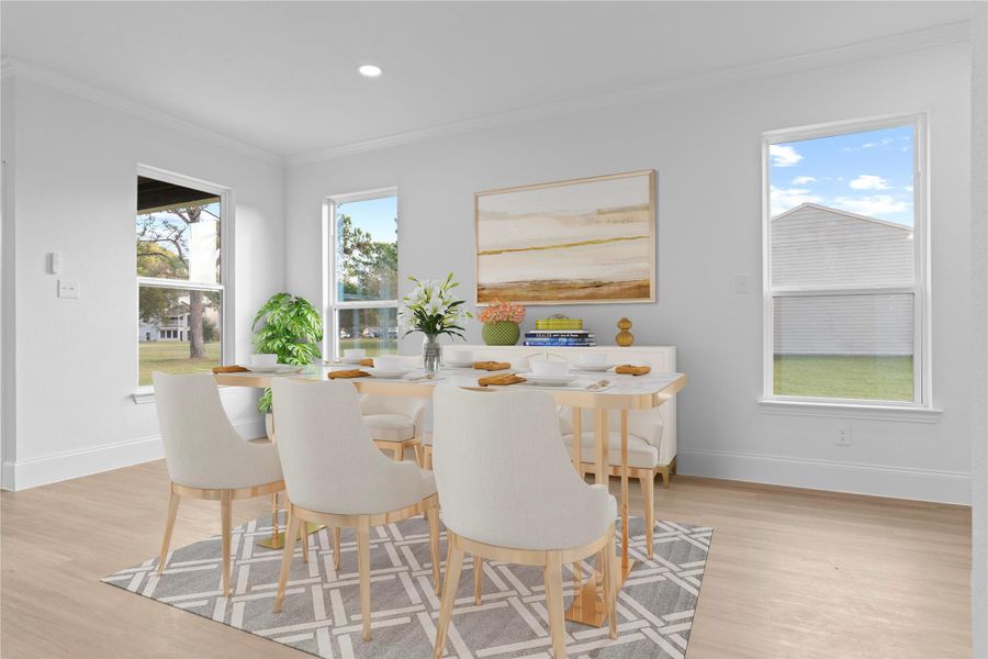 Notice all the custom features the large baseboards, the crown molding surrounding the ceilings and the Luxury large plank flooring for carefree maintenance.