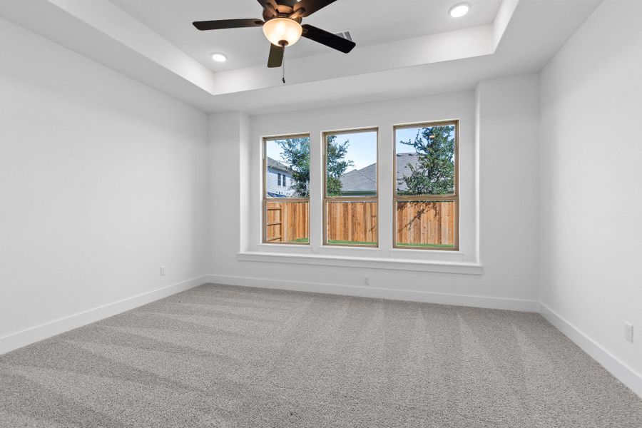 Primary Bedroom with tray ceiling Primary Bedroom with tray ceiling