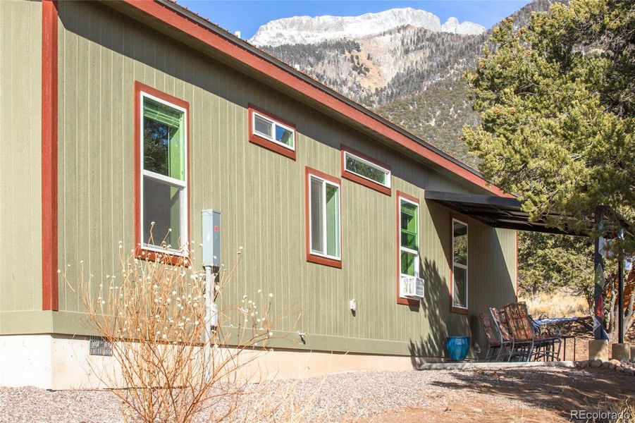 Front exterior of a new home in , Crestone, CO, highlighting curb appeal (Image 20).