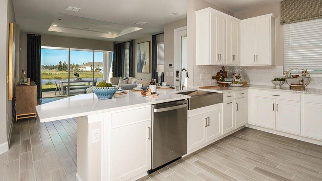 Furnished interior view inside a new home in Esplanade at McKinnon Groves, Winter Garden (Image 11).