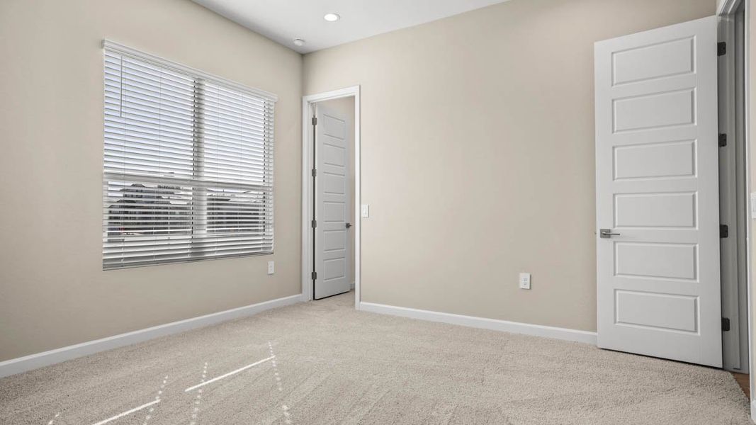 Spacious, unfurnished interior of a new home in Zanjero Pass, Waddell (Image 36).