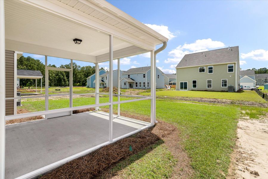 Front exterior of a new home in Oakley Pointe, Moncks Corner, SC, highlighting curb appeal (Image 2).