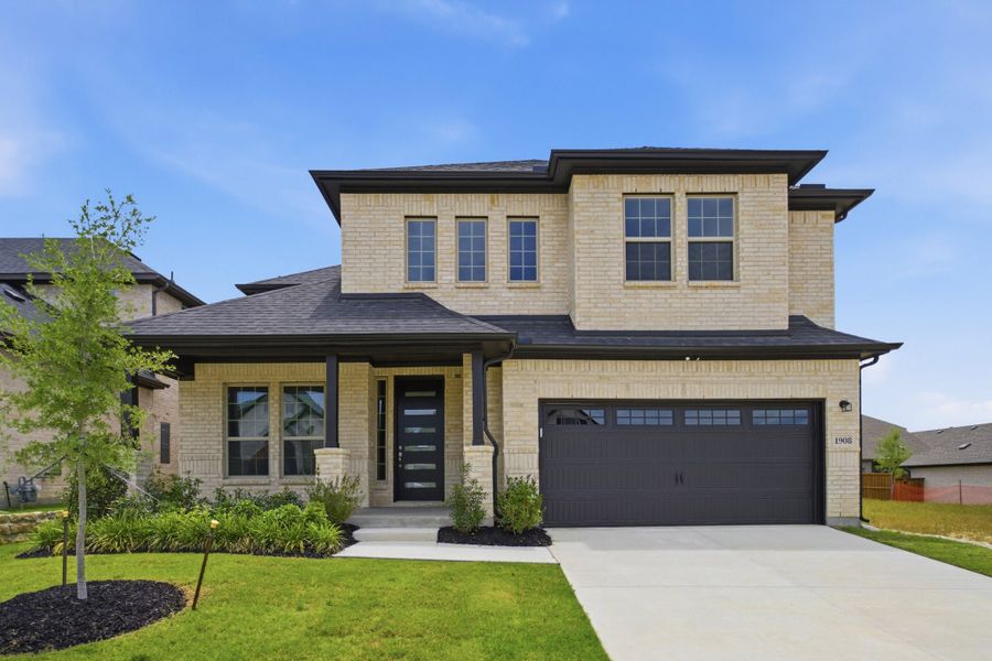 Front exterior of a new home in La Terra, Celina, TX, highlighting curb appeal (Image 2). Front exterior of a new home in La Terra, Celina, TX, highlighting curb appeal (Image 2).