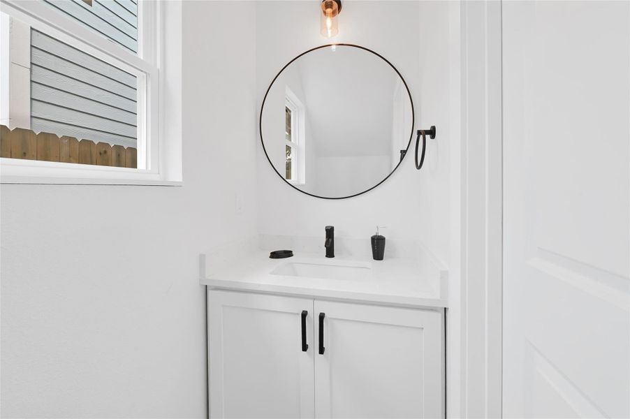 Contemporary tile work and black hardware. Contemporary tile work and black hardware.