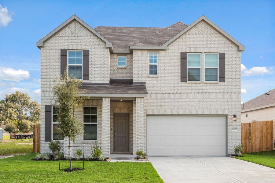 Front exterior of a new home in Russell Ranch, Bay City, TX, highlighting curb appeal (Image 17). Front exterior of a new home in Russell Ranch, Bay City, TX, highlighting curb appeal (Image 17).