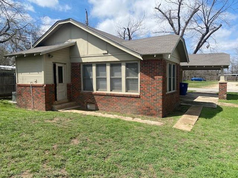 Exterior details and patio area of a home in , Brownwood (Image 14). Exterior details and patio area of a home in , Brownwood (Image 14).