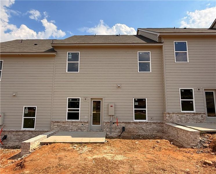 Front exterior of a new home in Leydenview, Mableton, GA, highlighting curb appeal (Image 2).