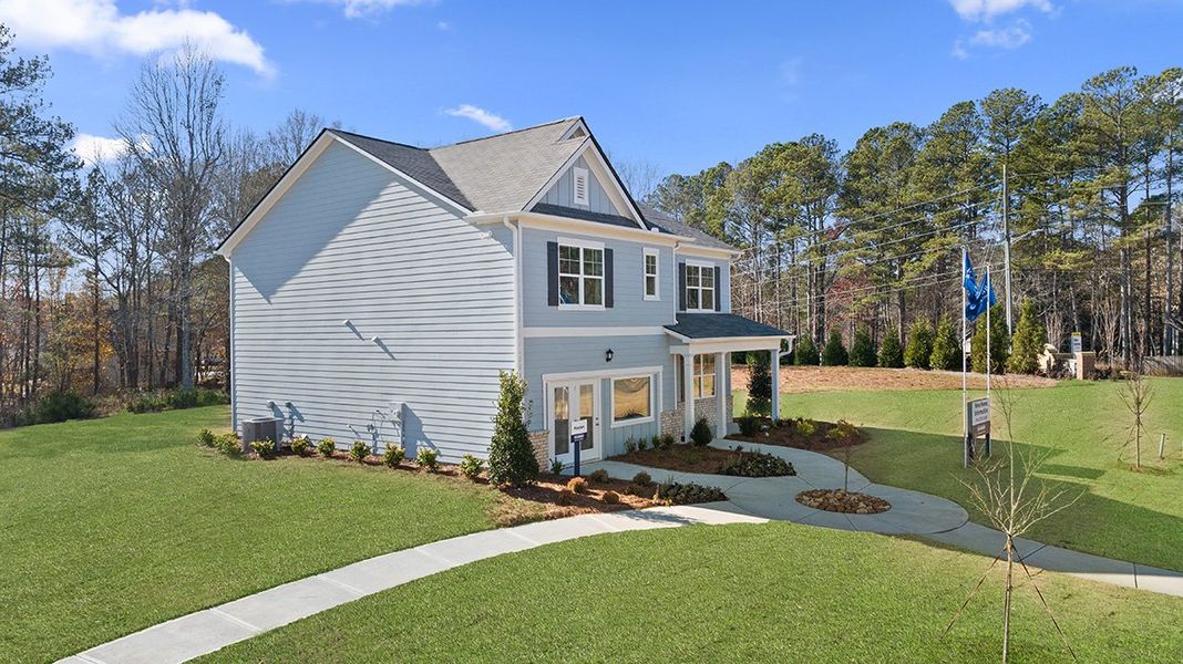 Front exterior of a new home in Thompson Ridge, Dallas, GA, highlighting curb appeal (Image 1).