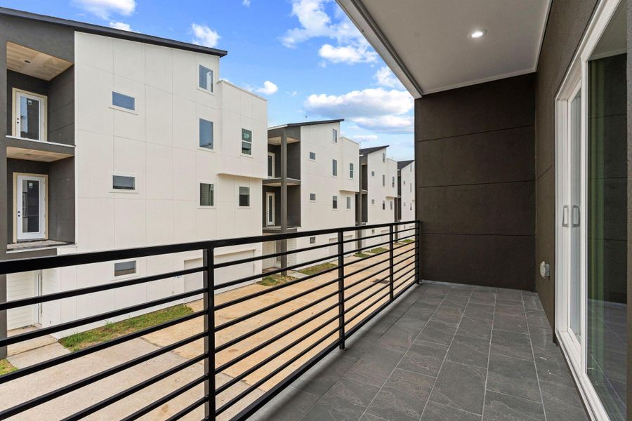 Exterior details and patio area of a home in , Houston (Image 2).