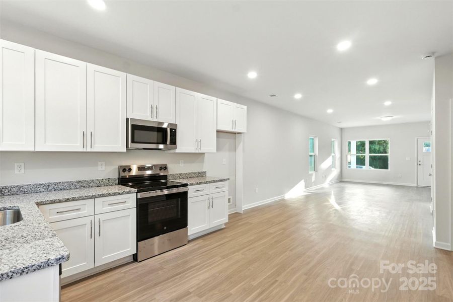 Furnished interior view inside a new home in , Granite Falls (Image 9).