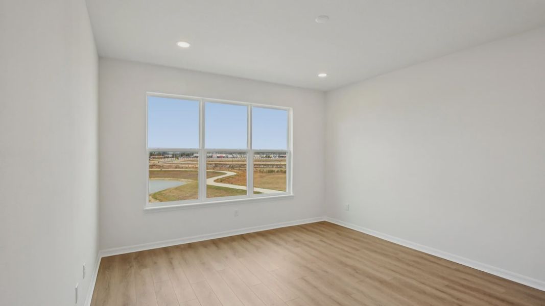 Furnished interior view inside a new home in Isla Mirada, San Antonio (Image 23).