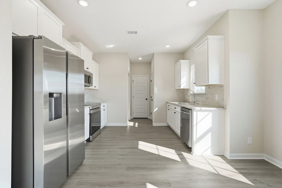 Representative furnished interior of a home built from the The Chatman by RTS Homes in The Gardens at 15 West, Hinesville (Image 8).