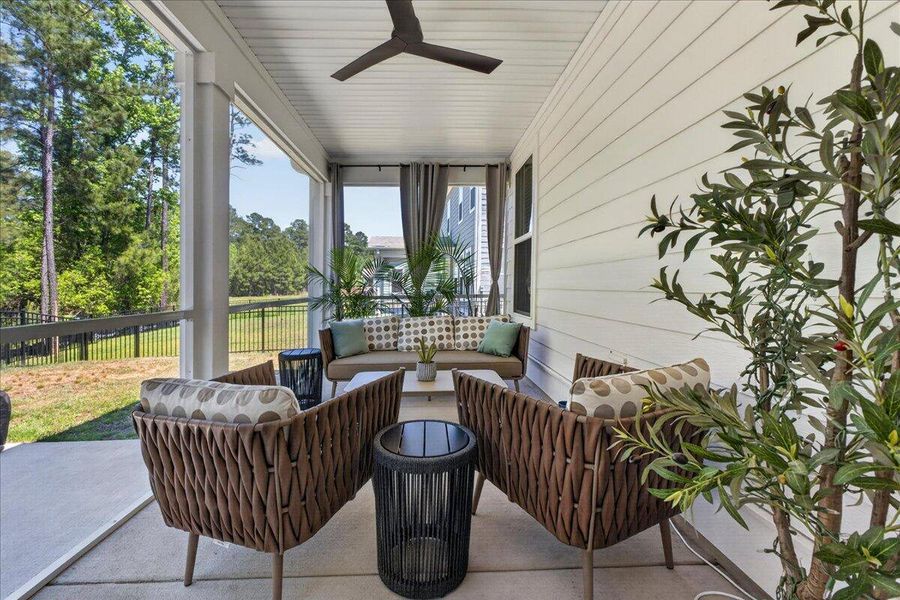 Exterior details and patio area of a home in Tidewater at Lakes of Cane Bay, Summerville (Image 3).