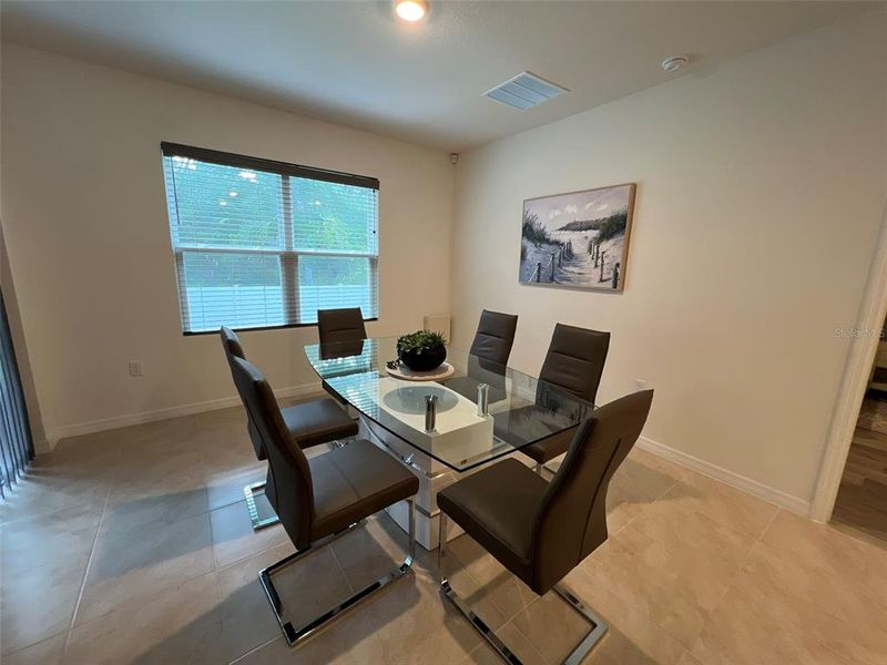Furnished interior view inside a new home in Charles Cove, Davenport (Image 8).