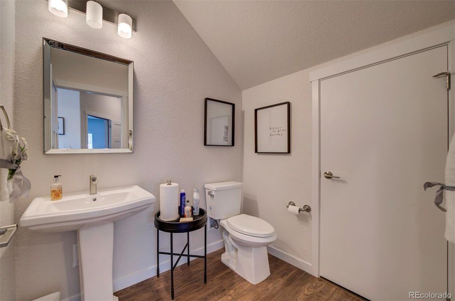 Powder room is bright and accessible.