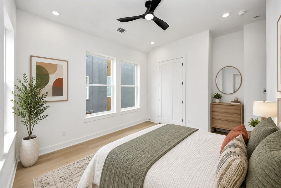 Virtually staged third bedroom located on the third floor.