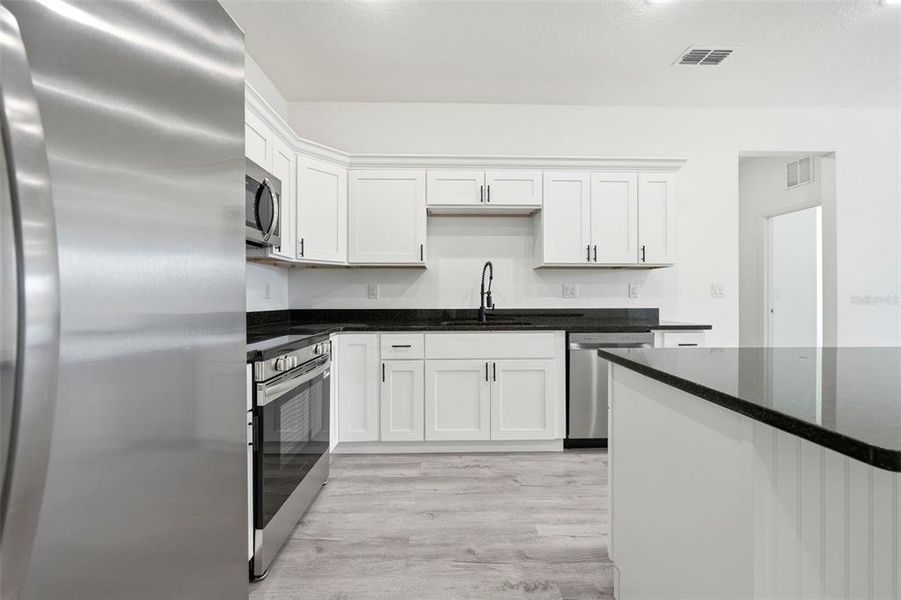 Furnished interior view inside a new home in , Haines City (Image 44).