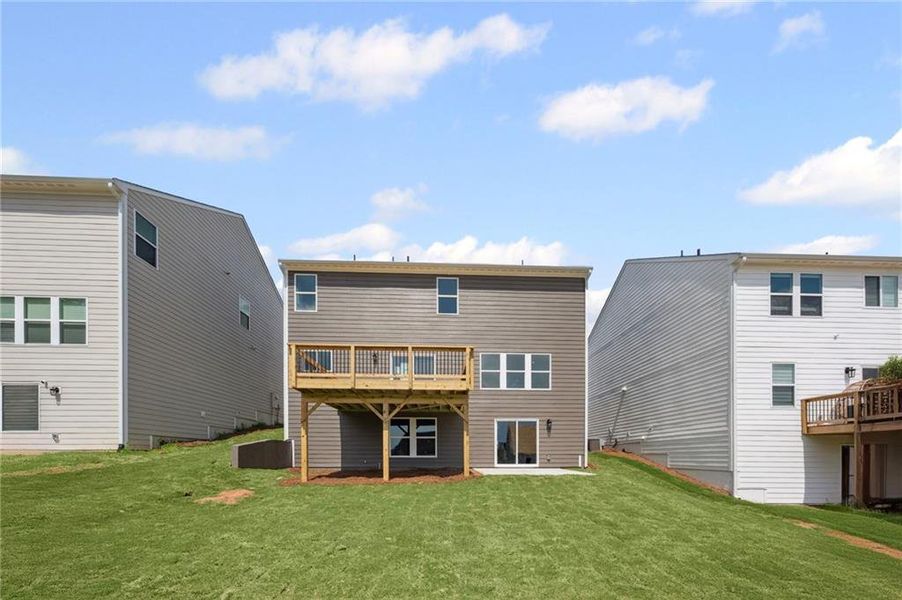 Front exterior of a new home in Twin Lakes, Braselton, GA, highlighting curb appeal (Image 2).