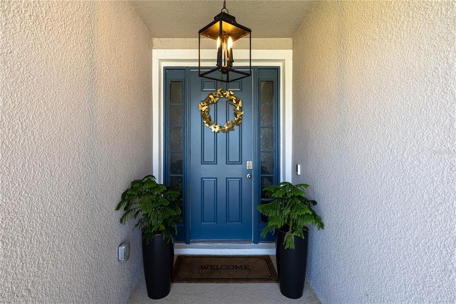 Exterior details and patio area of a home in Farm at Varrea, Plant City (Image 4).