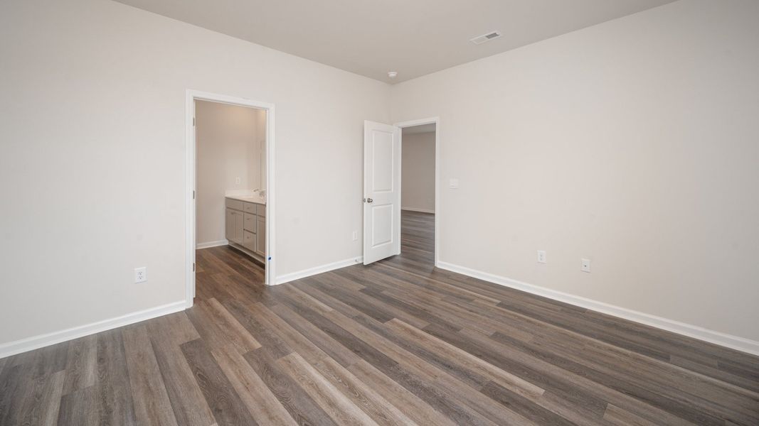 Representative unfurnished interior of a home built from the WREN by D.R. Horton in Sidbury Station, Castle Hayne (Image 16).