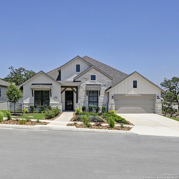 Front exterior of a new home in , Boerne, TX, highlighting curb appeal (Image 21). Front exterior of a new home in , Boerne, TX, highlighting curb appeal (Image 21).