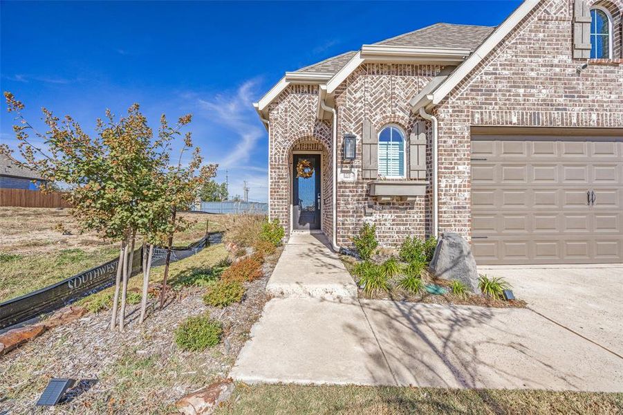 Exterior details and patio area of a home in Bel Air Village, Sherman (Image 21).