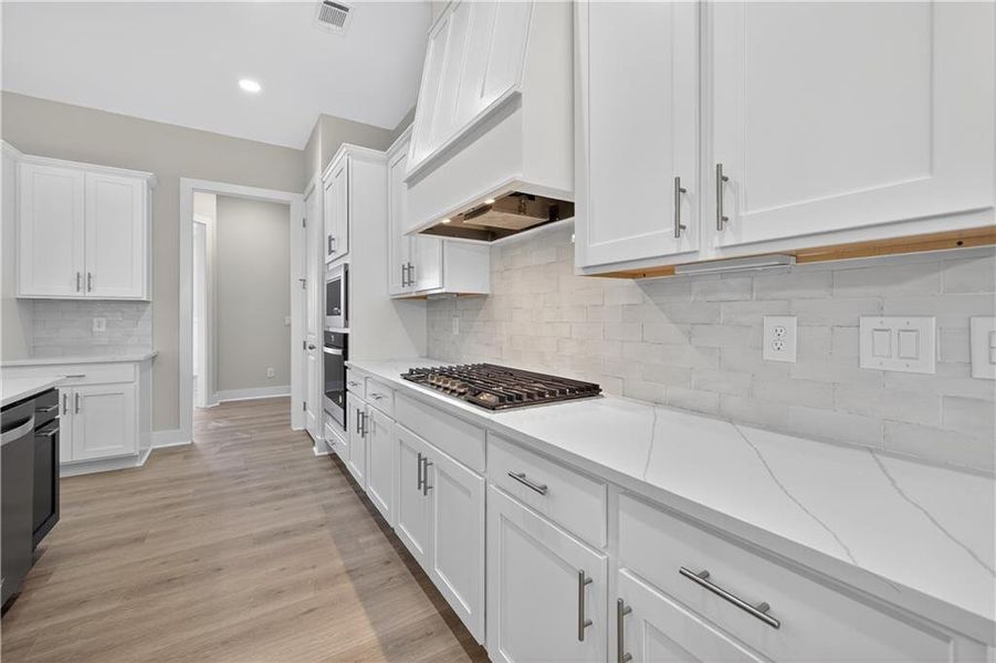 Furnished interior view inside a new home in , Cumming (Image 10). Furnished interior view inside a new home in , Cumming (Image 10).