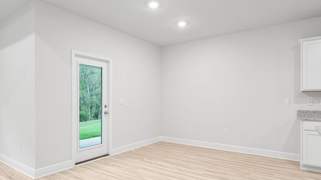Representative unfurnished interior of a home built from the The Rhett by D.R. Horton in Pine Creek and Heron Walk, Port St. Joe (Image 31).