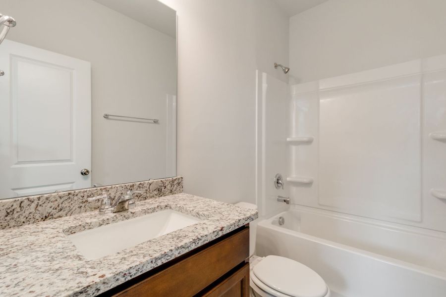 Furnished interior view inside a new home in Pecan Orchard, Elgin (Image 9).