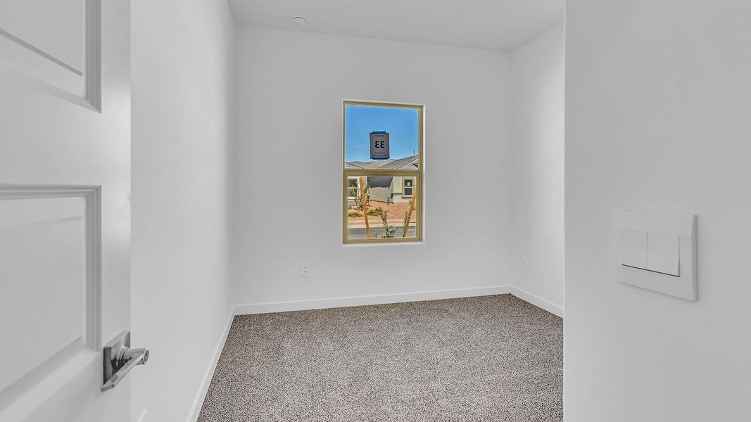 Representative unfurnished interior of a home built from the Harris by D.R. Horton in The Oasis at Rocking K, Vail (Image 18).