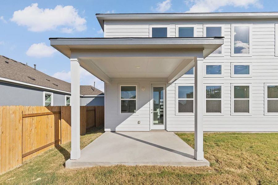 Exterior details and patio area of a home in Enclave at Cele, Pflugerville (Image 3).