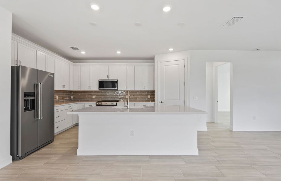 Furnished interior view inside a new home in Arbor Oaks, North Port (Image 4).