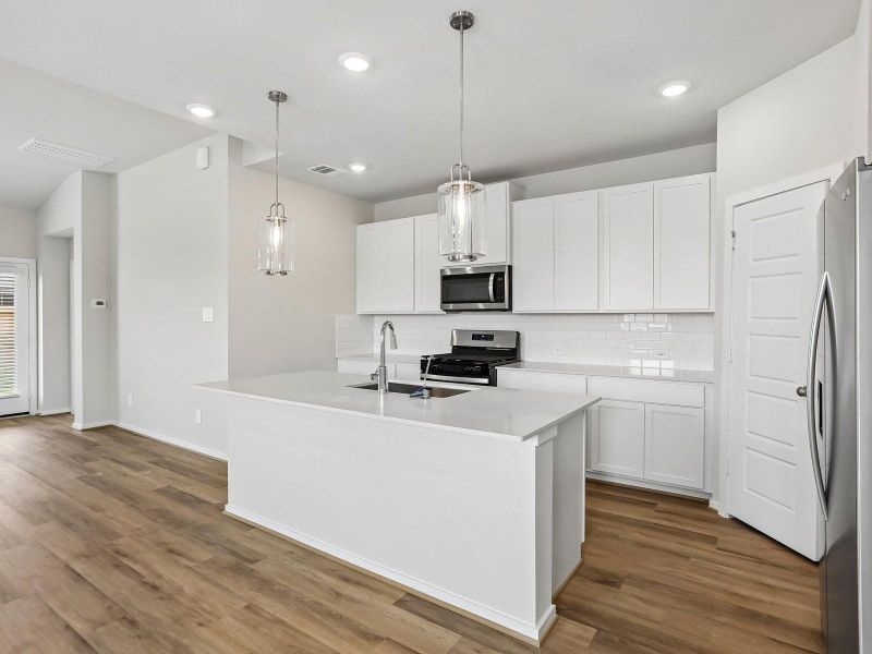 Photo is not of the actual home, but is an inspirational photo of builder’s model home and may depict options, furnishings, and/or decorator features that are not included