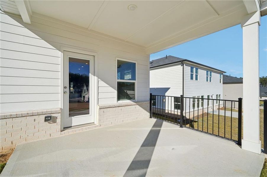 Exterior details and patio area of a home in Parkside at Grayson, Grayson (Image 24).