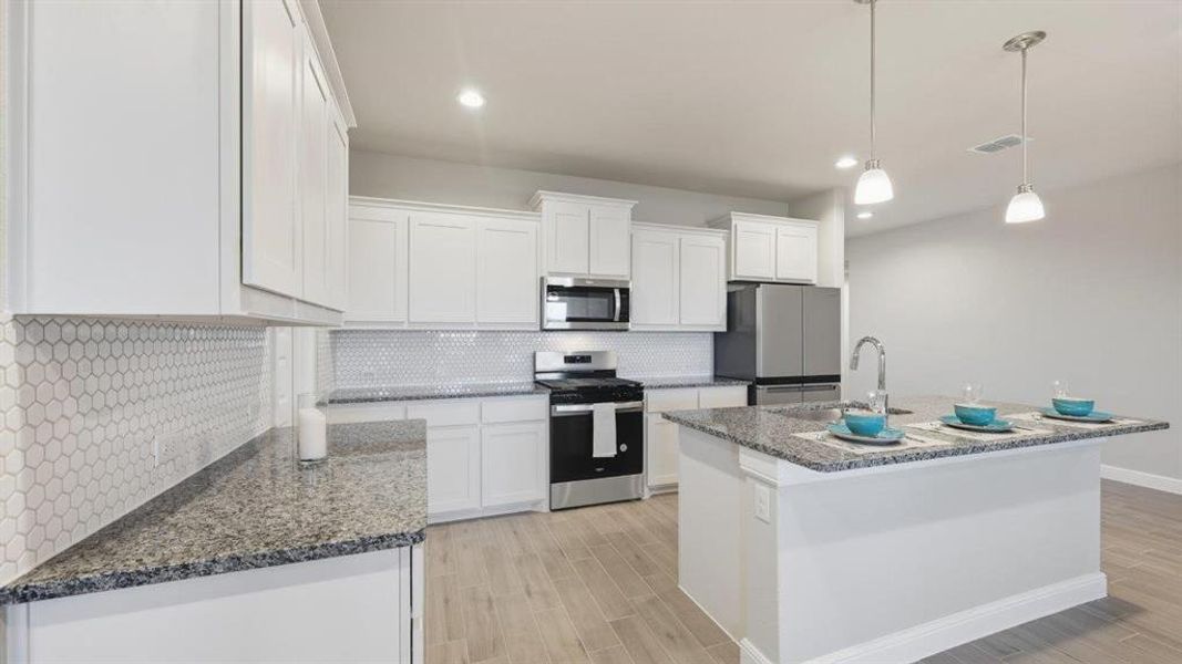 Kitchen - All Home and community information, including pricing, included features, terms, availability and amenities, are subject to change at any time without notice or obligation. All Drawings, pictures, photographs, video, square footages, floor plans, elevations, features, colors and sizes are approximate for illustration purposes only and will vary from the homes as built. Kitchen - All Home and community information, including pricing, included features, terms, availability and amenities, are subject to change at any time without notice or obligation. All Drawings, pictures, photographs, video, square footages, floor plans, elevations, features, colors and sizes are approximate for illustration purposes only and will vary from the homes as built.