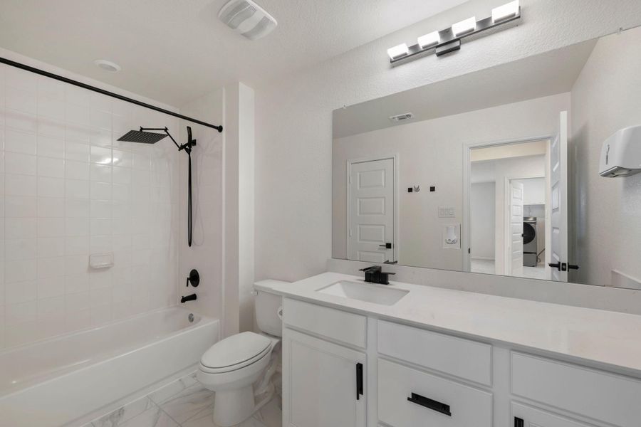 Furnished interior view inside a new home in Sonterra - Cool Water, Jarrell (Image 15).