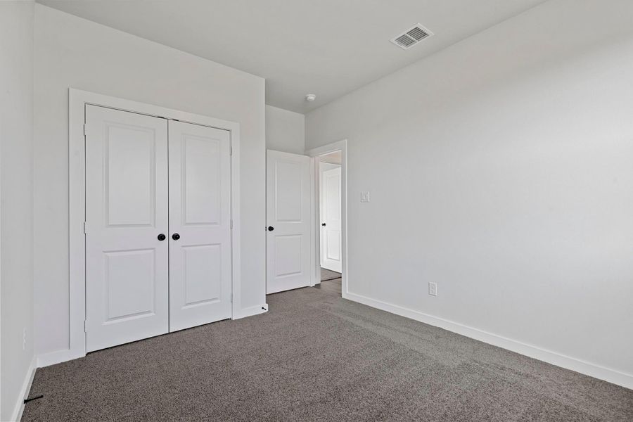 Representative unfurnished interior of a home built from the Garrison II by Cheldan Homes in Arbor Oaks, Boyd (Image 40).