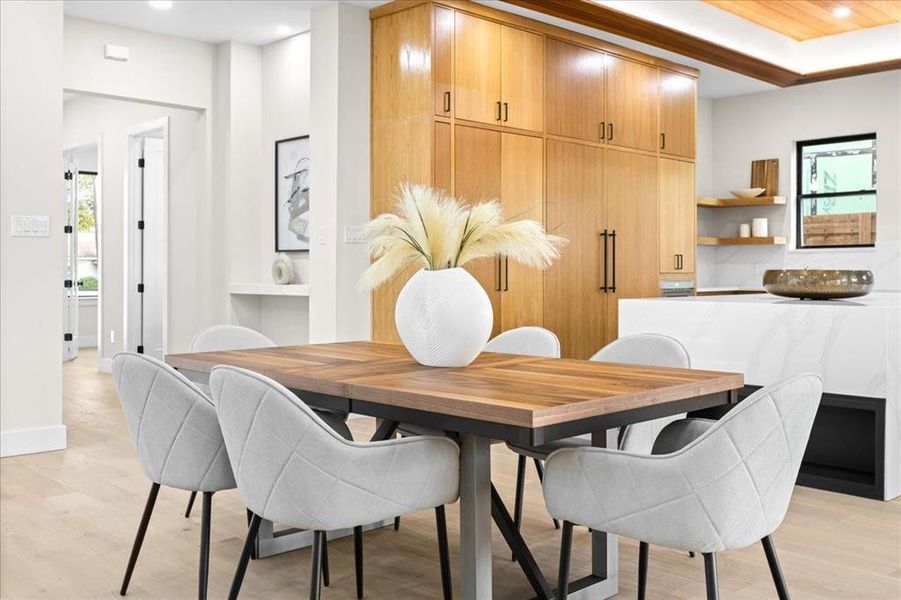 Dining space featuring light hardwood / wood-style flooring