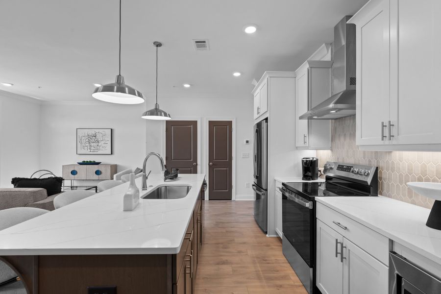 Representative furnished interior of a home built from the The Oleander by The Providence Group in Market Square at Sawnee Village, Cumming (Image 11).