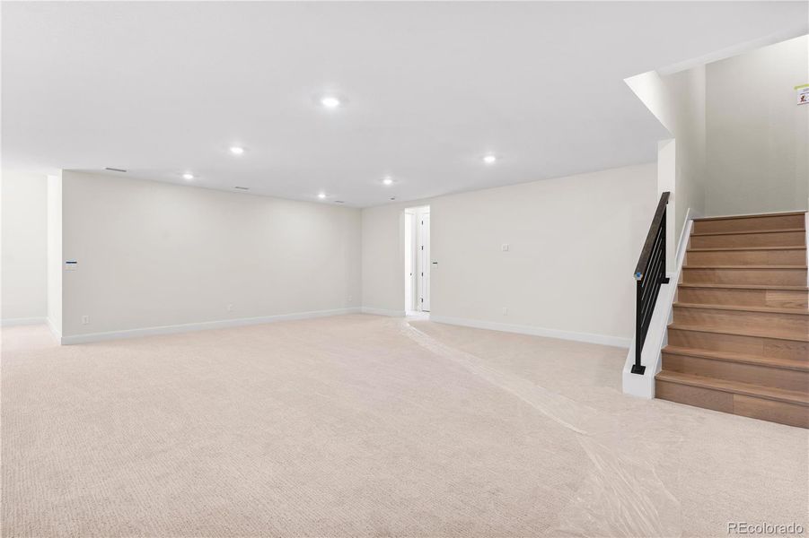 Spacious, unfurnished interior of a new home in Luxe at The Canyons, Castle Pines (Image 22).