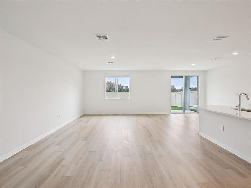 Spacious, unfurnished interior of a new home in The Grove at Stuart Crossing - Classic Series, Bartow (Image 13).