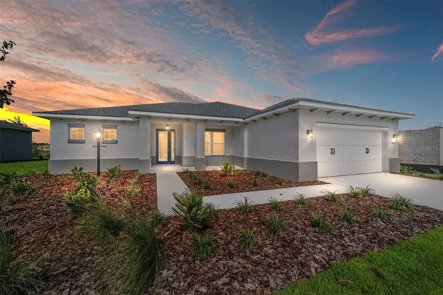 Front exterior of a new home in On Top of the World Communities, Ocala, FL, highlighting curb appeal (Image 20).
