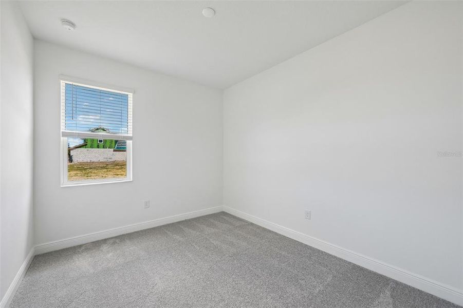 Spacious, unfurnished interior of a new home in Grand Park, Sarasota (Image 33).