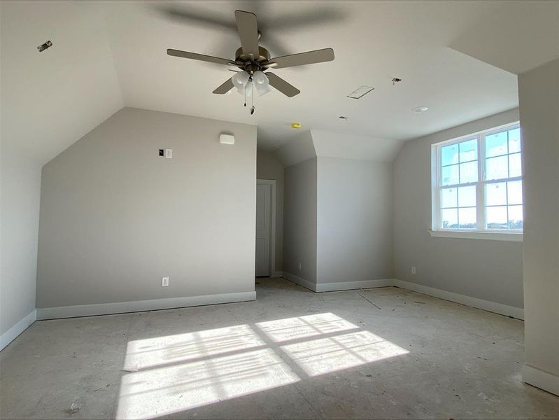 Additional living space with ceiling fan and vaulted ceiling Additional living space with ceiling fan and vaulted ceiling