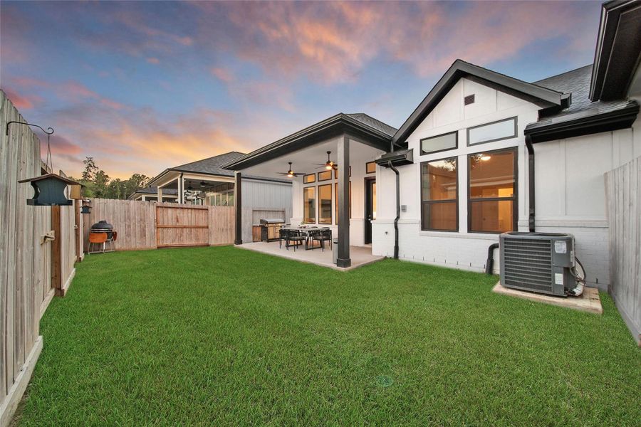Exterior details and patio area of a home in The Highlands: Highland Duets, Porter (Image 3). Exterior details and patio area of a home in The Highlands: Highland Duets, Porter (Image 3).
